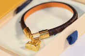 LV ALMA PINK GOLD CANVAS