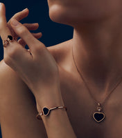 HAPPY HEART ONYX RING PINK GOLD