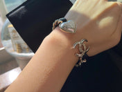 CHANEL 26S DOUBLE C LOGO BAROQUE PEARL LEATHER CHAIN BRACELET IN GOLD METAL 630841