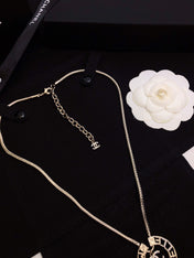CHANEL 26S CHANEL CC LOGO MADEMOISELLE ROUND NECKLACE IN GOLD METAL 633322