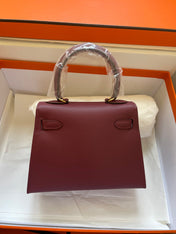 KELLY MINI 20 BAG IN GARNET RED CALFSKIN WITH GOLD HARDWARE
