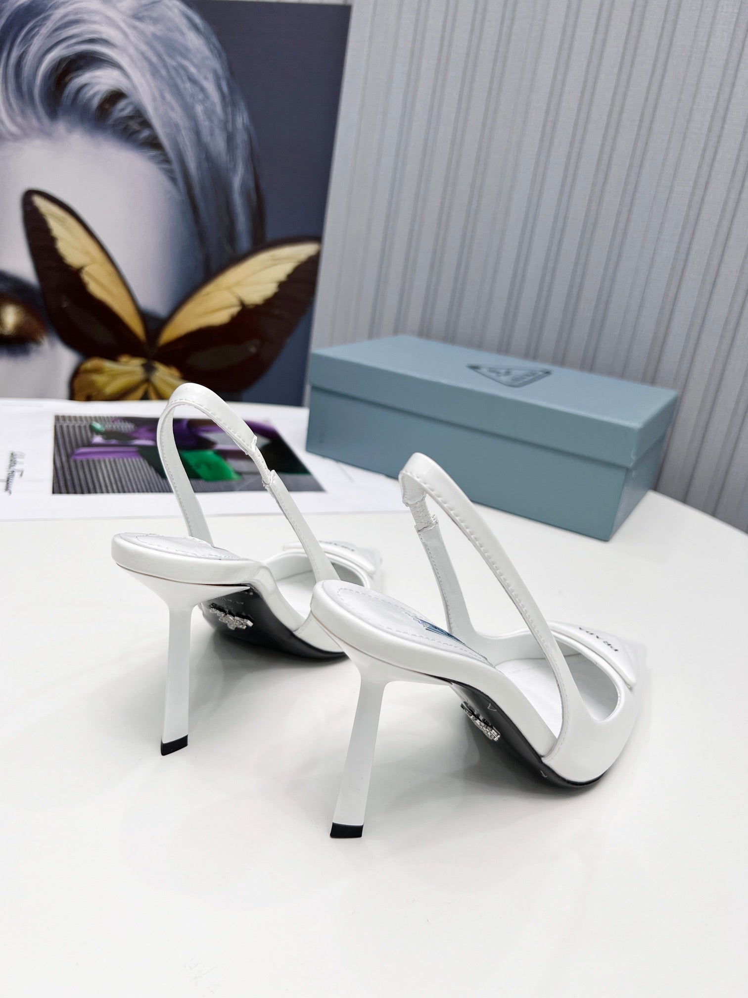 PRADA 26S SLINGBACK PUMPS STILETTO HEEL 95MM IN WHITE PATENT CALFSKIN LOGO