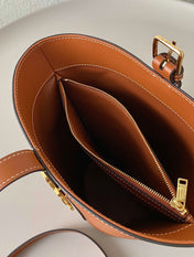 TRIOMPHE 25 BUCKET BAG CINNAMON BROWN CALFSKIN