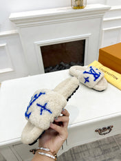 LV FLAT SLIPPER IN WHITE MIX COBALT BLUE SHEARLING