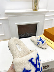 LV FLAT SLIPPER IN WHITE MIX COBALT BLUE SHEARLING