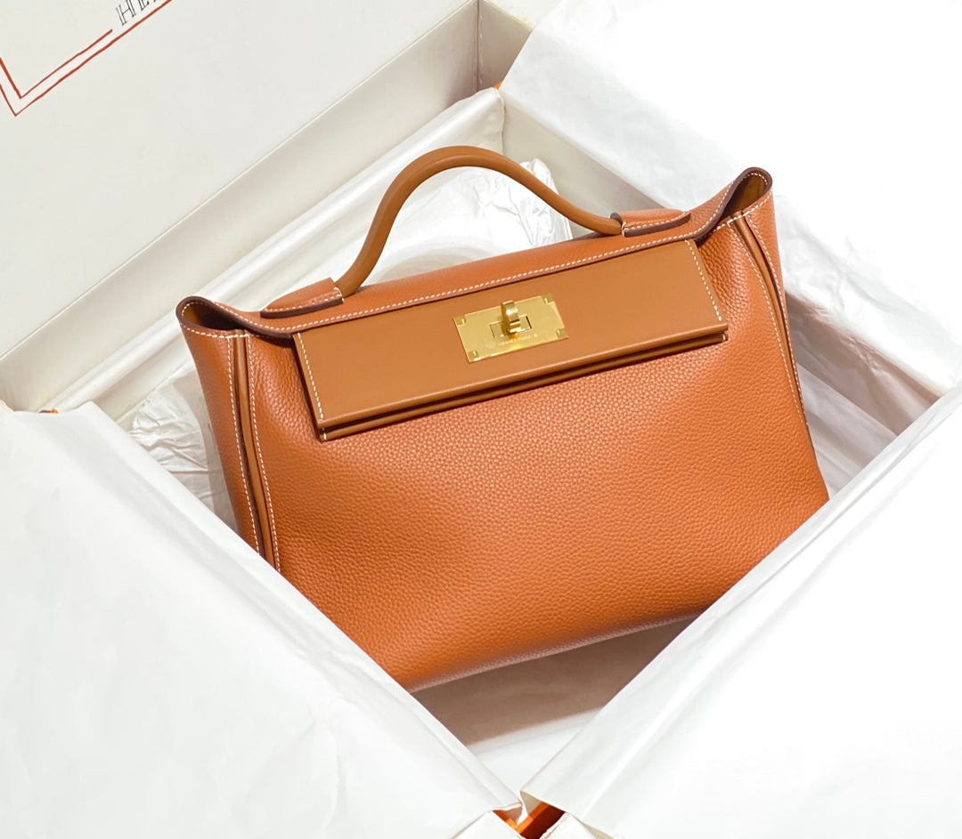 HM 26S 24/24 29MM IN ORANGE EVERCOLOR CALFSKIN GOLD KELLY BUCKLE