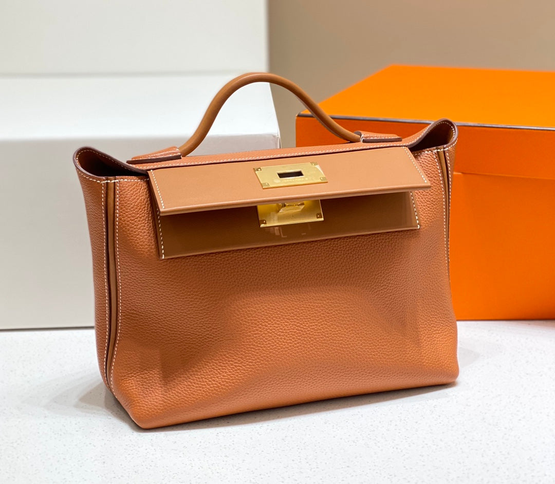 HM 26S 24/24 29MM IN ORANGE EVERCOLOR CALFSKIN GOLD KELLY BUCKLE