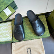 INTERLOCKING G MULE IN BLACK CALFSKIN