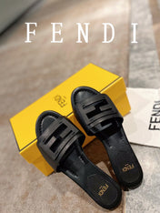 FENDI BAGUETTE SLIDES IN BLACK LAMBSKIN