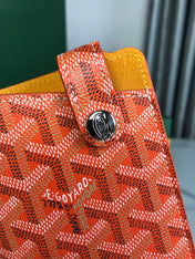 MONTMARTRE GM CASE 18 IN ORANGE GOYARDINE CANVAS