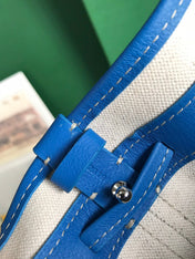 PETIT FLOT BUCKET BAG 22 IN SAPPHIRE BLUE GOYARDINE CANVAS AND LAMBSKIN TRIM