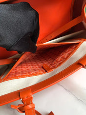 BELLECHASSE BIAUDE PM BAG 36 IN ORANGE GOYARDINE CANVAS AND CALFSKIN TRIM