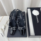 CHANEL 26S HIGH-HEEL SLINGBACKS 65 MM IN BLACK MIX WHITE TWEED
