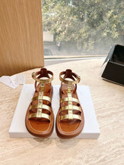 LYMPIA GLADIATOR SANDAL IN GOLD METALLIC CALFSKIN
