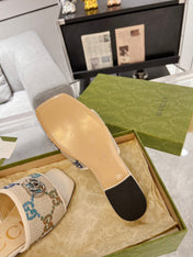 GG EXCLUSIVE SLIDE SANDAL IVORY SEDGE WITH NAVY PATTERN