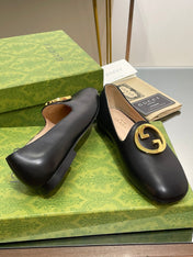 BLONDIE LOGO-PLAQUE LOAFERS IN BLACK CALFSKIN WITH GOLD HARDWARE