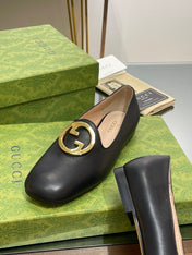 BLONDIE LOGO-PLAQUE LOAFERS IN BLACK CALFSKIN WITH GOLD HARDWARE