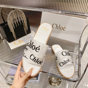 WOODY SLIPPER IN WHITE MIX BLACK CANVAS