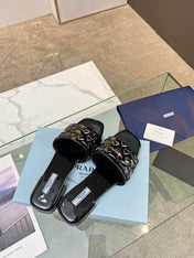 PRA EMBROIDERED SLIDES FLAT BLACK CALFSKIN