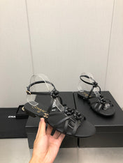 FLORAL FLAT SANDAL IN BLACK LAMBSKIN