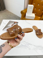 TRIOMPHE SLIDE IN BRONZE BROWN CALFSKIN