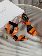 BALMAIN 25S HIGH HEEL SANDALS 95MM IN BURNT ORANGE GLOSSY CALFSKIN