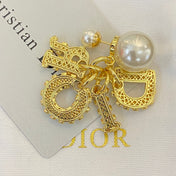 CD 26S CRYSTAL CD CHARM PEARL DROP EARRINGS IN GOLD METAL 633101