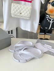 THONG SANDALS IN WHITE RUBBER