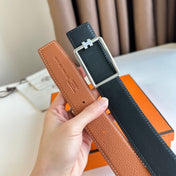 HM TUBE H BELT BUCKLE & REVERSIBLE BLACK AND YAM ORANGE LEATHER STRAP 38MM SILVER HARDWARE
