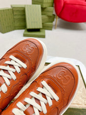 GG EMBOSSED TRAINER CARAMEL CALFSKIN