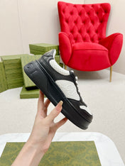 GG EMBOSSED TRAINER BLACK AND WHITE CALFSKIN