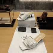 PRADA 26S OPEN TOE MULES 45MM IN IVORY WHITE PATENT CALFSKIN WITH ROSETTE