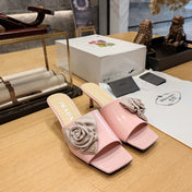 PRADA 26S OPEN TOE MULES 45MM IN BLUSH PINK PATENT CALFSKIN WITH ROSETTE