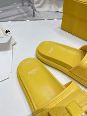 FENDI BAGUETTE SLIPPERS IN NAPLES YELLOW LAMBSKIN WITH GOLD HARDWARE