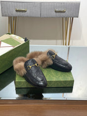 HORSEBIT MULE IN BLACK EMBOSSED CALFSKIN AND LAMB WOOL LINING