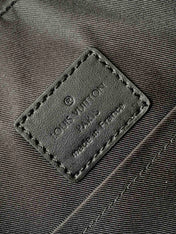 DISCOVERY BACKPACK 41 IN BLACK MONOGRAM MACASSAR CANVAS AND CALFSKIN