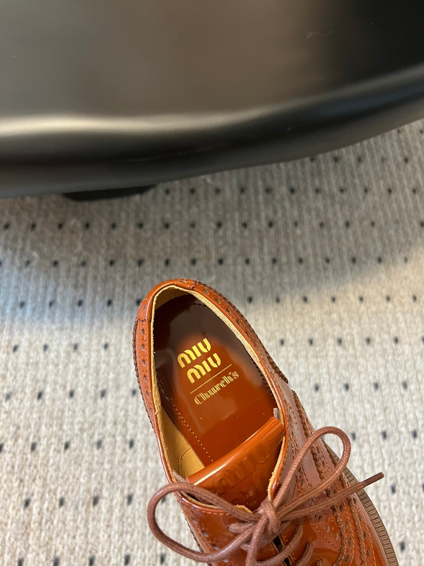 MIUMIU 26S LACE-UP BROGUE LOAFERS IN RUST ORANGE PATENT CALFSKIN