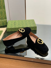 BLONDIE LOGO-PLAQUE LOAFERS IN BLACK SUEDE WITH GOLD HARDWARE