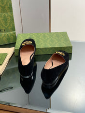 BLONDIE LOGO-PLAQUE LOAFERS IN BLACK SUEDE WITH GOLD HARDWARE