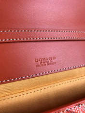 MONTE-CARLO PM CLUTCH 25 IN ORANGE GOYARDINE CANVAS