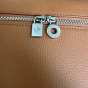 EXTRA POCKET BACKPACK L23.5 IN GINGER ORANGE CALFSKIN WITH SILVER HARDWARE