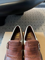 MIUMIU 26S FRINGE BUCKLE LOAFERS IN BROWN CALFSKIN