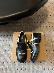 MIUMIU 26S FRINGE BUCKLE LOAFERS IN BLACK CALFSKIN