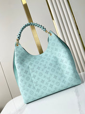 CARMEL 40 IN SKY BLUE MONOGRAM PERFORATED CALFSKIN