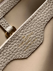 CAPUCINES BB 27 IN KHAKI BROWN TAURILLON GOLD HARDWARE