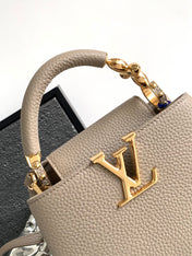 CAPUCINES MINI 21 IN KHAKI BROWN TAURILLON GOLD HARDWARE