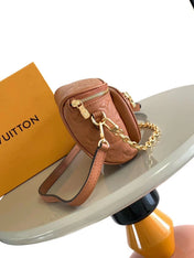 MINI BUMBAG 17 IN COGNAC MONOGRAM EMPREINTE LEATHER GOLD HARDWARE