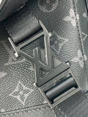 MESSENGER VOYAGER PM 33 IN GUN METAL MONOGRAM ECLIPSE CANVAS