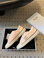 TRAINER LOW LACE-UP SNEAKER IN LIGHT ORANGE CANVAS