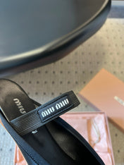MIUMIU 26S BALLET MULES IN BLACK SATIN WITH BOW